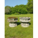 A set of four octagonal composition stone gothic planters