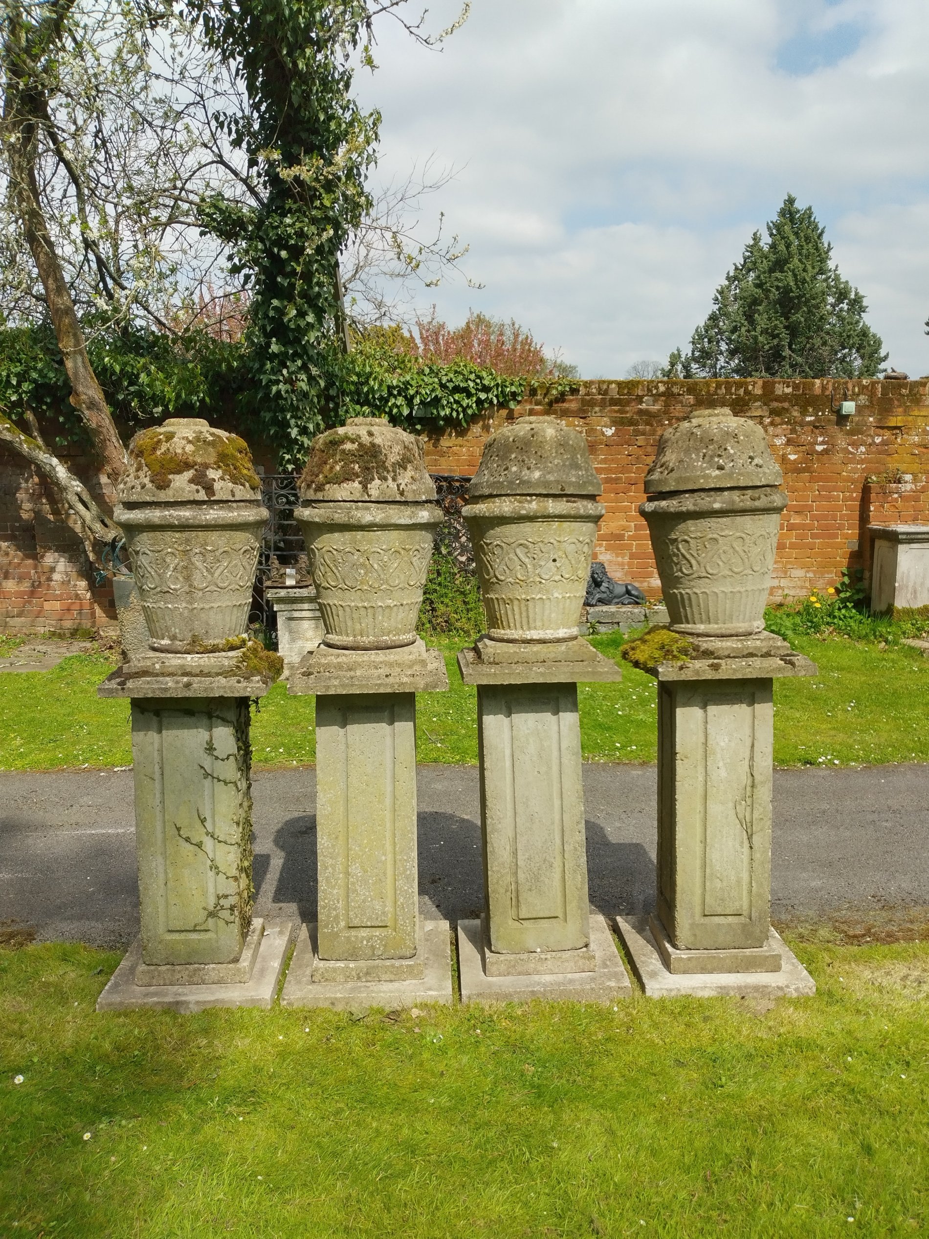 A set of four composition stone finials on plinths - Image 2 of 2