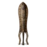 A carved hardwood tribal wall figure