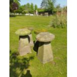 A set of four sandstone staddlestones with composition bases