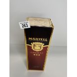 A bottle of Duty Free export only Martell three star cognac brandy