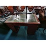 Green leather topped pedestal desk