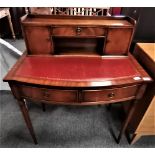 Antique writing desk with red leather top