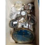 A box of wrist and pocket watches