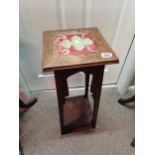 Mahogany plant stand with centre tile on top