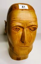 Carved wooden head