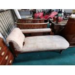 Chaise longue with carved frame on casters