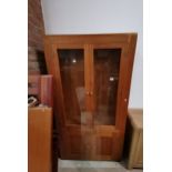 Oak display cabinet with glass shelves