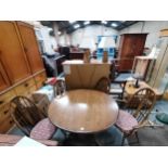 Round Ercol dining table and 4 chairs