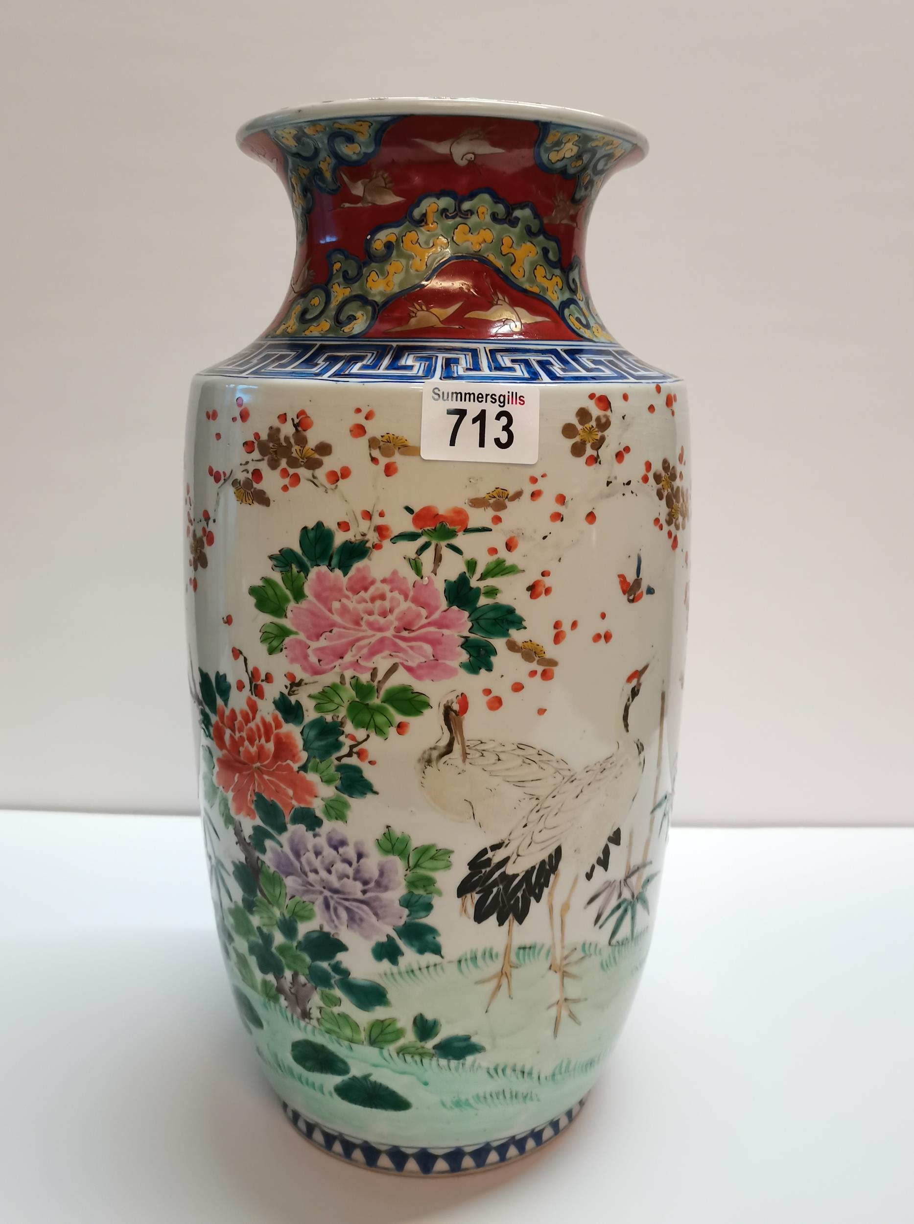 Large Chinese Vase with stork decoration and 7 charter marks on the base. Hairline crack on top of