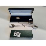 A set of Silver golf spoons - hallmarked