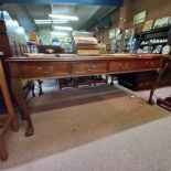 Mahogany partners desk with green leather and carved queen Anne legs