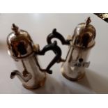 A pair of solid Silver coffee pots (hallmarked)