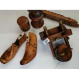 A collection of antique wooden items including weavers shuttle