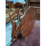 Pine round kitchen table and 3 chairs