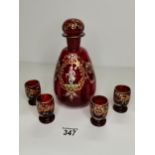 x1 Red glass decanter with x4 matching liquor glasses