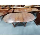 Dark Oak "D" End extending dining table with barley twist legs