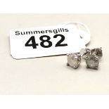 A Pair of Diamond stud earrings - 2 carat (one in each) set in 18 carat gold