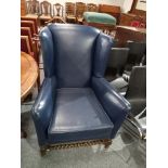 Antique Blue leather wing back chair