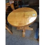 An Otterman circular side table in ex condition
