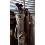 7 Walking Sticks I walkers Seat and a Golf Bag with approx 15 Clubs