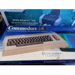 Commodore 64 and VIC 20 Computers with Boxes and discs Controllers etc