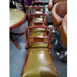 Mahogany and leather top extendable dining table with 4 chairs.