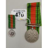 x2 Medals including The Defence Medal 1939 - 1945 on ribbons