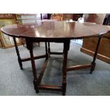 Oval Oak dropleaf gate legged table