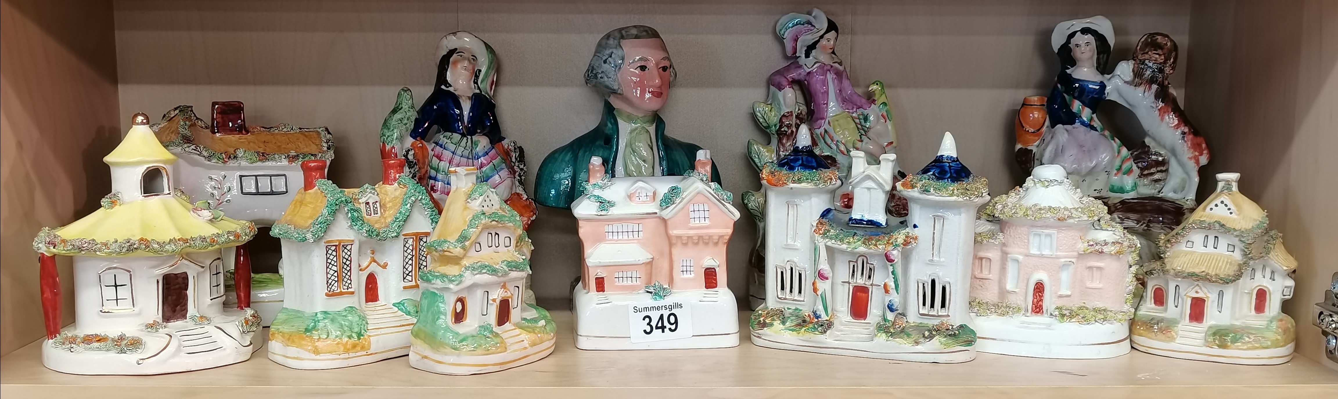 A large collection of Staffordshire Houses and figurines