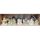 A large collection of Staffordshire Houses and figurines