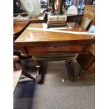 Antique mahogany sewing table with highly decorative carved decoration