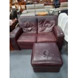 2 seater brown leather sofa and footstool