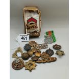 Collection of Military cap badges and medal