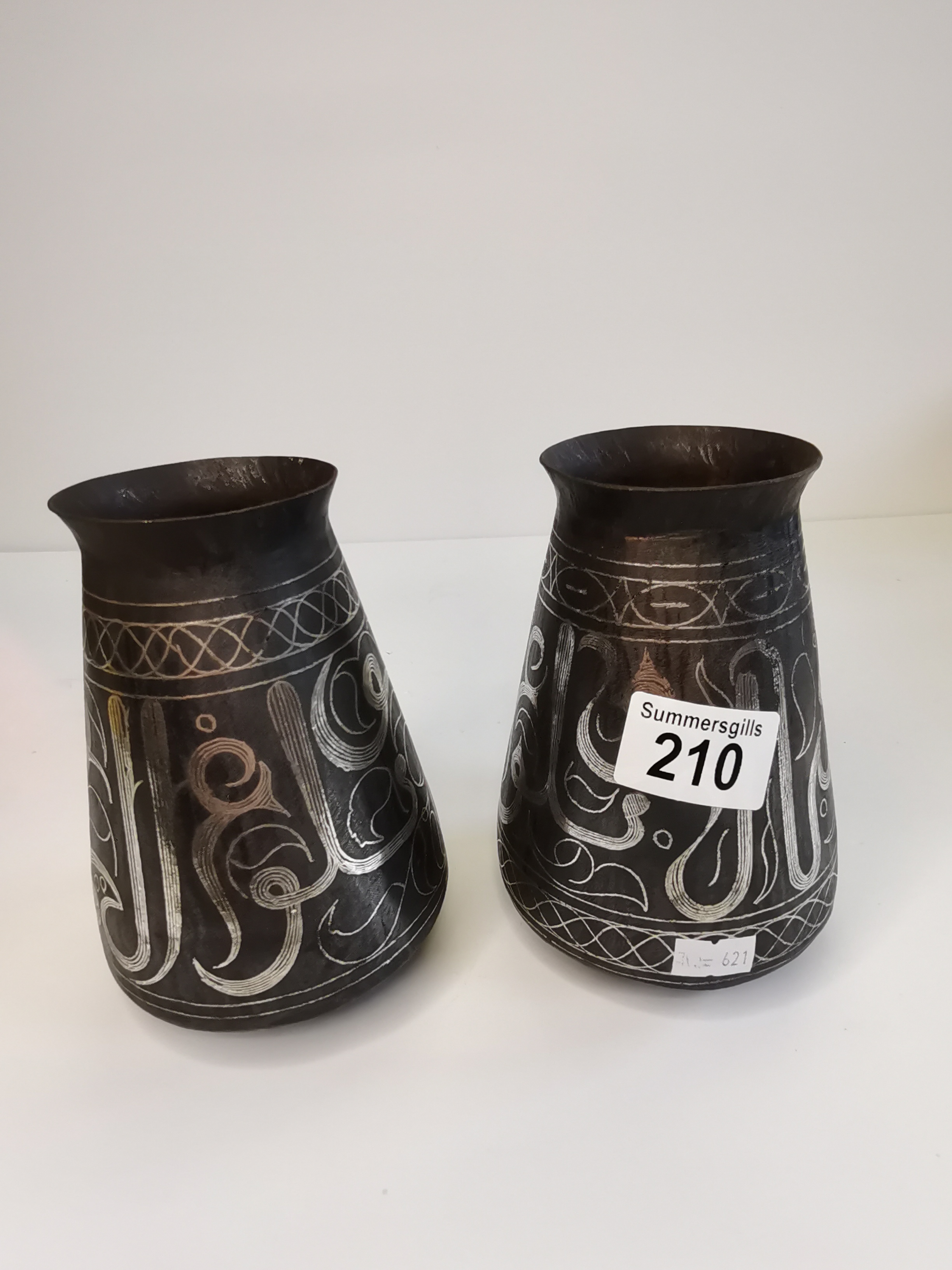 Pair of Qajar silvered with inlaid decoration vases