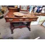 Antique mahogany wash stand with claw feet decorat