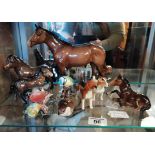 A collection of Beswick Animals including horses, dogs and birds