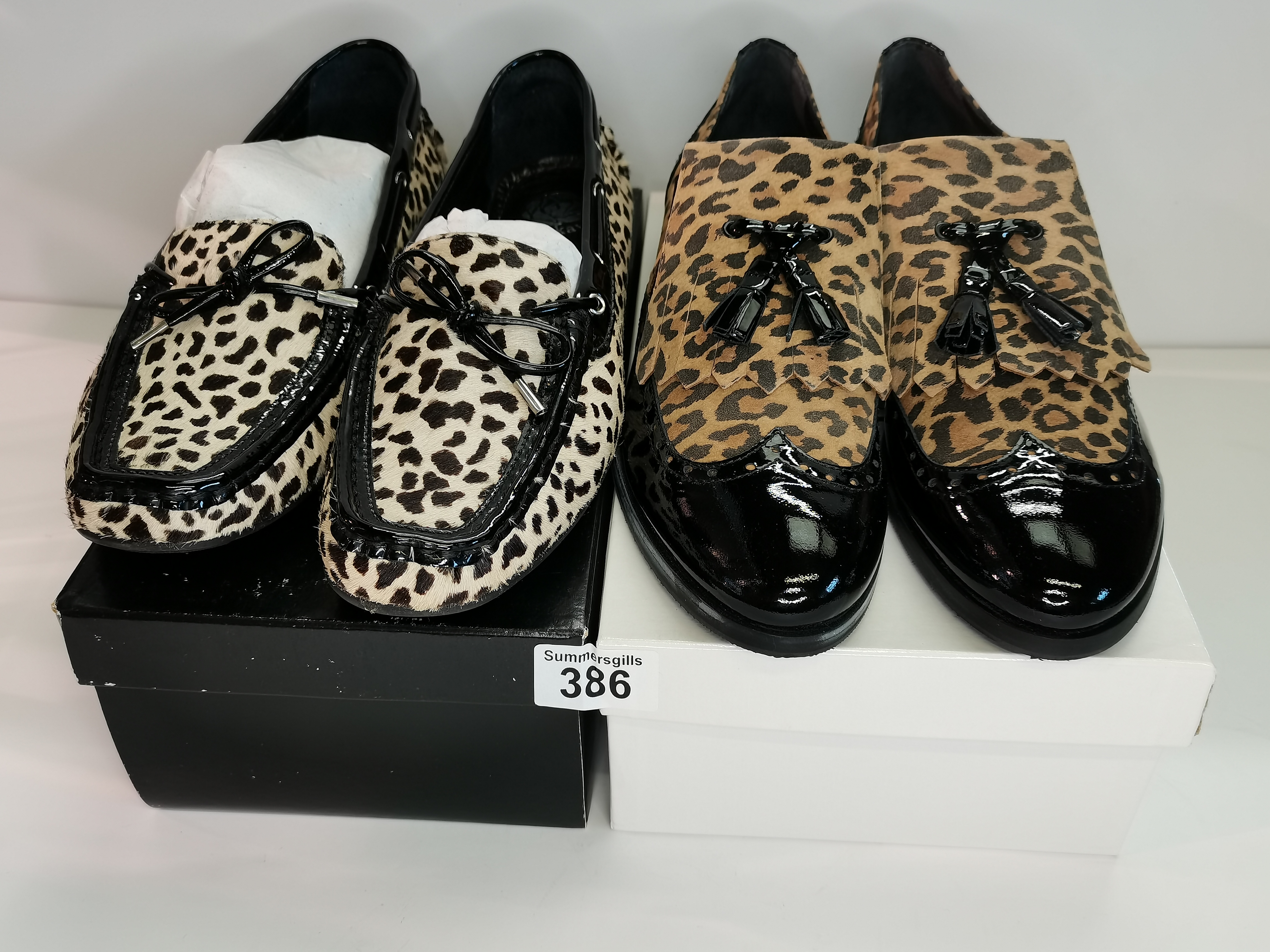 x2 pairs of animal print loafers