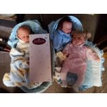 Several Dolls In Baskets with Bedding