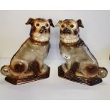 A pair of Scottish Bo'ness Pottery Pug dogs