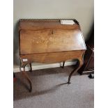 Antique walnut and marquetry bureau with brass detailing