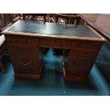 Leather topped pedestal desk