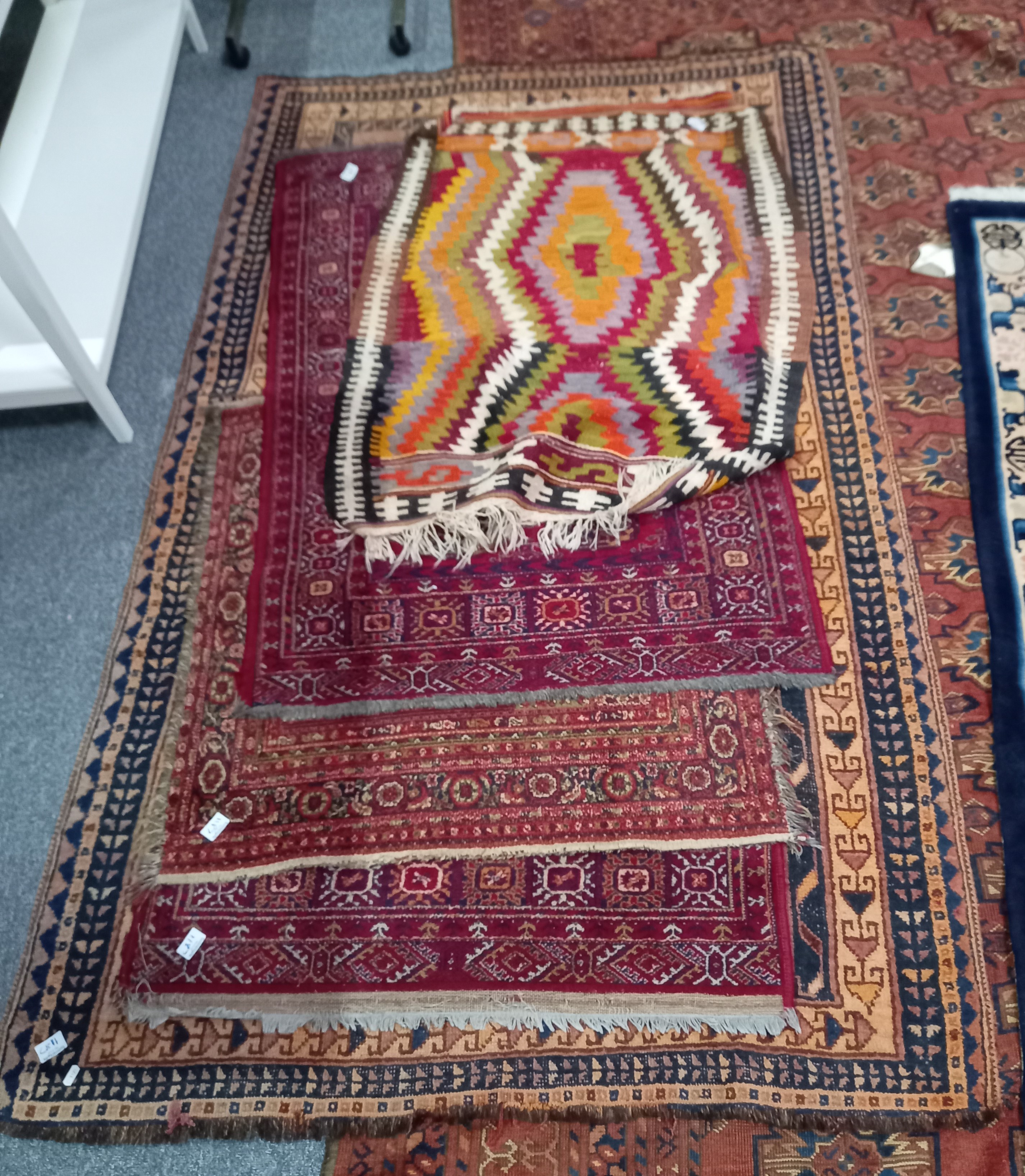 x5 Rugs of various sizes and colours