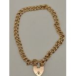 9ct yellow gold curb pattern bracelet with rose gold padlock clasp