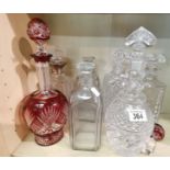 A collection of cut Glass Decanters including Cranbury Glass one