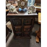 A cabinet with 6 drawers on each in mahogany style