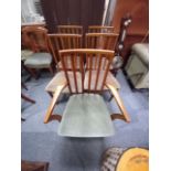 x4 Teak dining chairs plus x1 carver