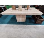 Travertine dining table on central base