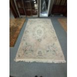 Large Pale pink and green rug