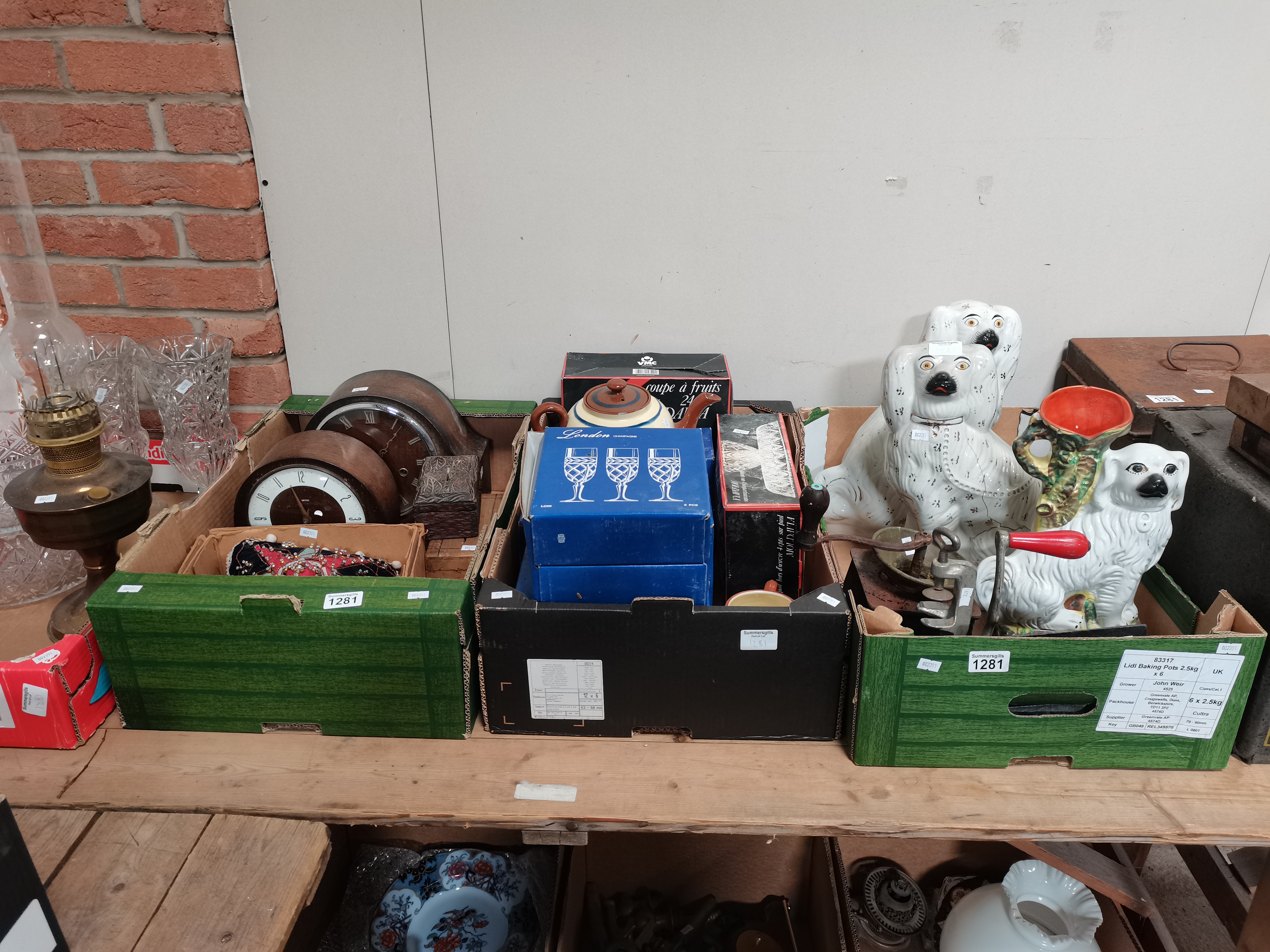 4 Boxes Containing Clocks, Crystal Glass, and Staffordshire Dog Ornaments A/F